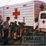 Red-cross-making-a-delivery