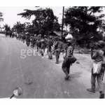 Troops-from-the-Nigerian-Federal-Army-marching-along-a-road-after-routing-Biafran-troops-at-Port-Harcourt-during-the-Biafran-War